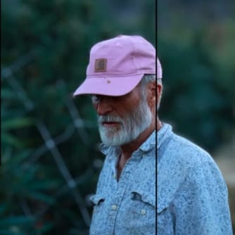 Victor Fresquet, founder and lead grower of Elk Creek Genetics, in a pink cap among plants